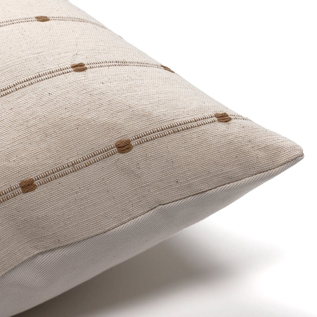 Upper corner of Colin and Finn's Rory pillow cover on a white background.