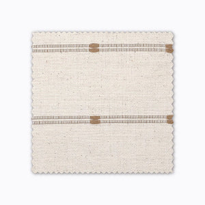 Rory fabric swatch from Colin and Finn. An ivory/cream Thai cotton with brown/tan woven stripes