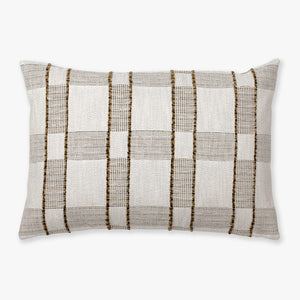 The Royce pillow cover from Colin and Finn. A plaid design with warm colors and fringe detailing