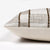 Side of the Royce pillow cover showing the front fabric and the ivory cotton backing