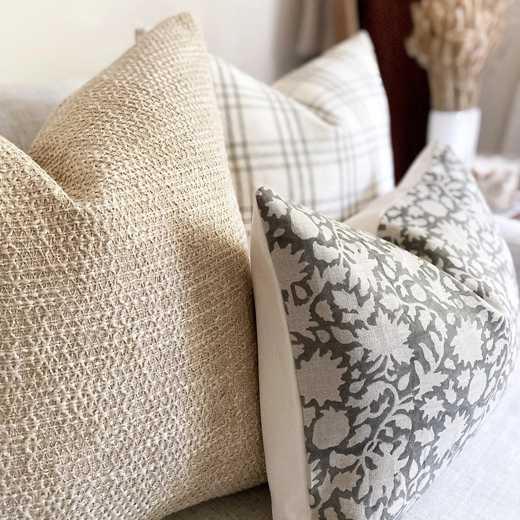 Closeup of Sawyer pillow cover from Colin and Finn showing gray floral details.