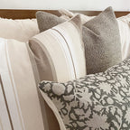 Closeup view of Waylon, Charles, and Sawyer showing the various textures of each pillow cover from Colin and Finn.