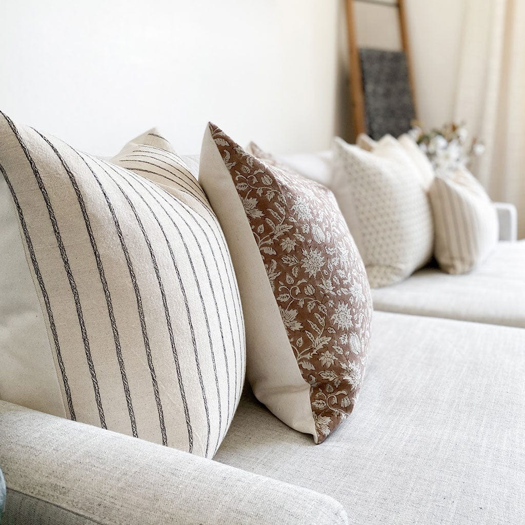 Close-up view of Winston and Eleanor natural pillow covers from Colin and Finn.