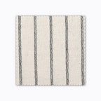Winston fabric swatch from Colin and Finn. An ivory/cream Thai cotton with black woven stripes